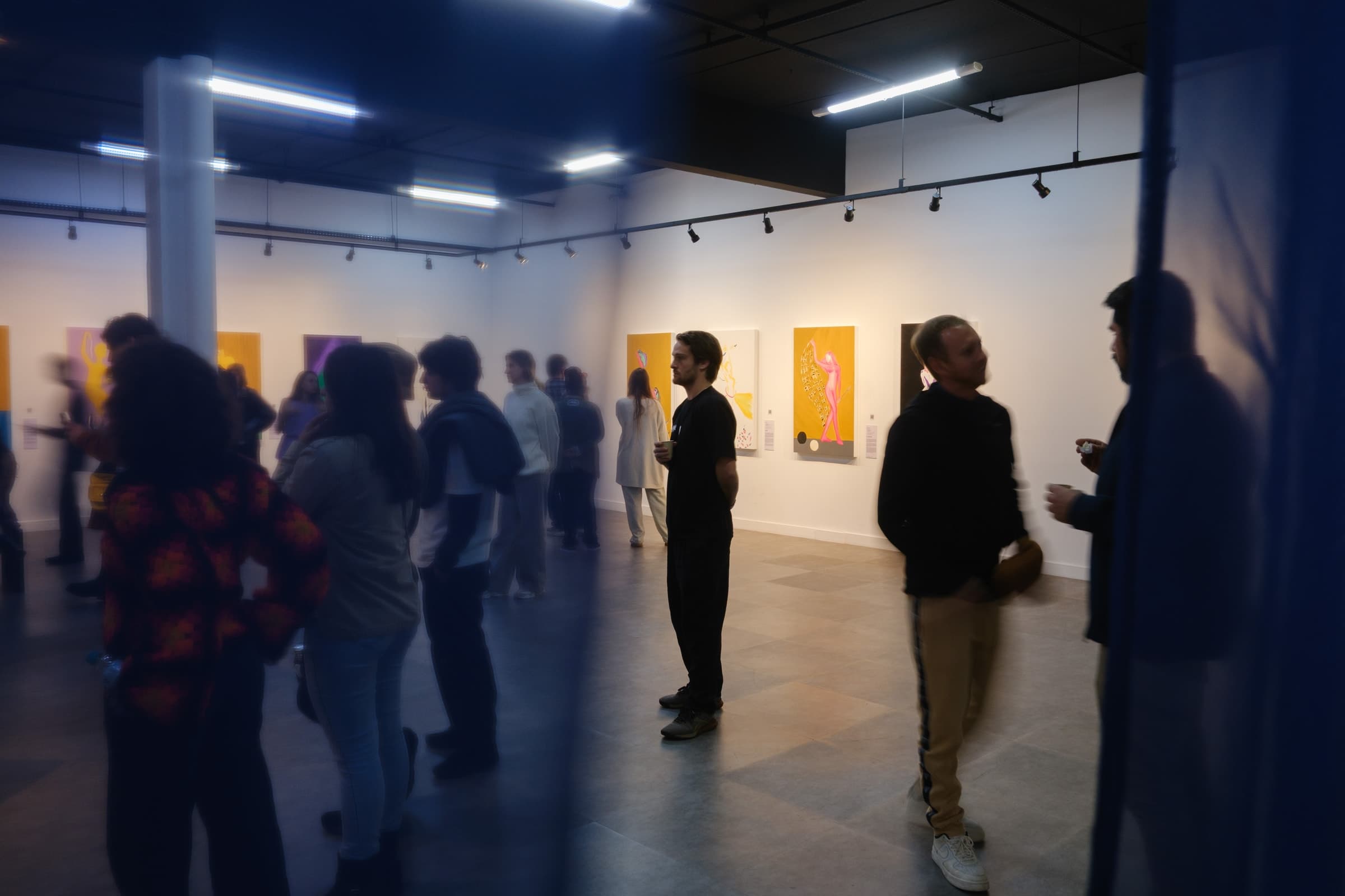 Visitors among the paintings
